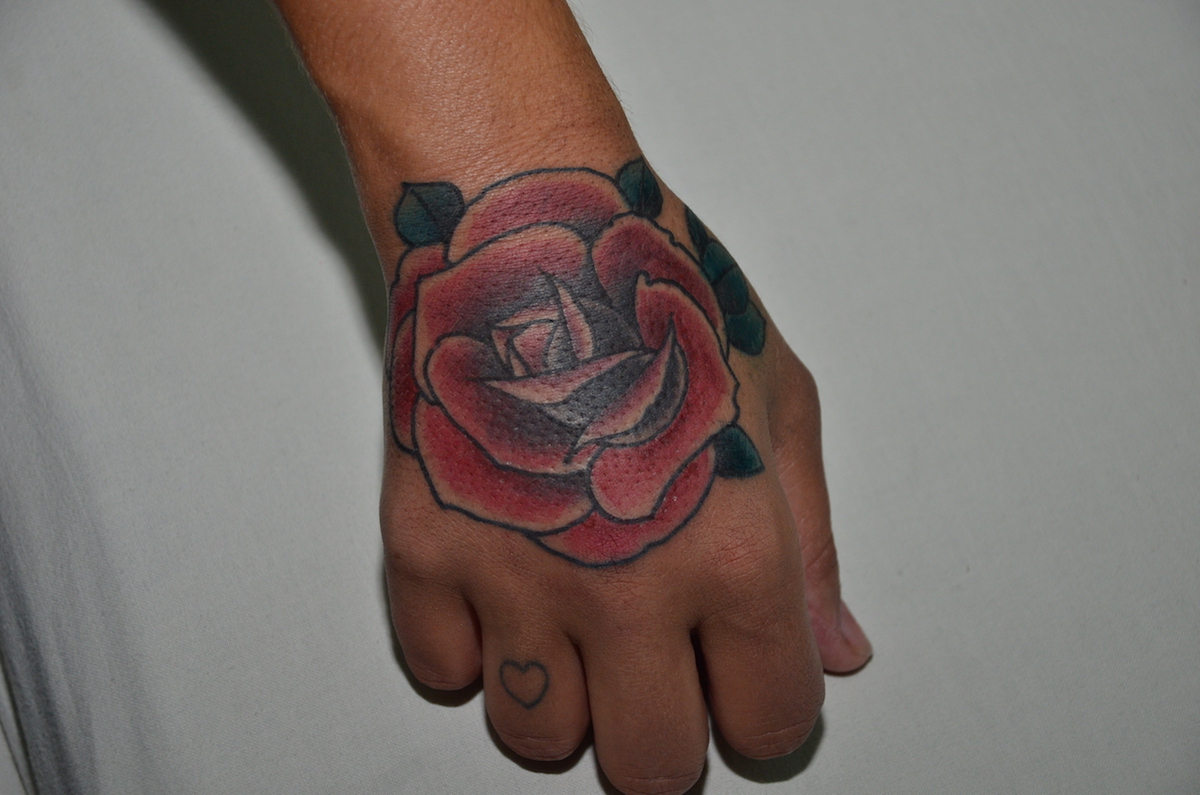 Nepalese rose tattoo